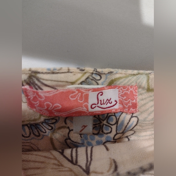 Lux cream miniskirt with floral pattern and ruffles size 7 
EUC - Picture 3 of 3